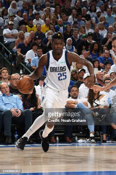 Reggie Bullock of the Dallas Mavericks drives to the basket against the Golden State Warriors during Game 4 of the 2022 NBA Playoffs Western...