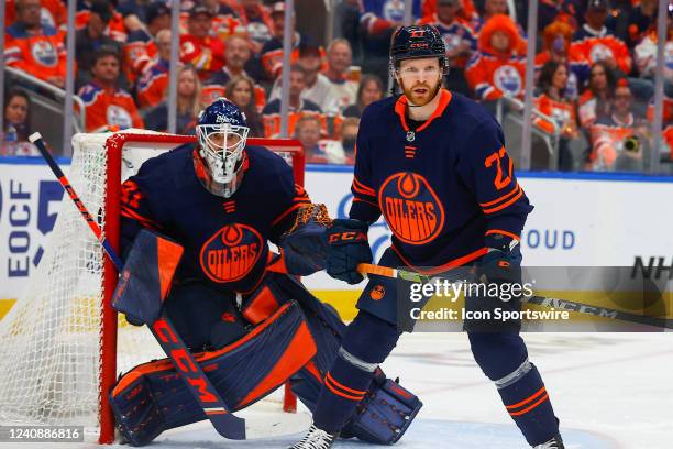 Edmonton Oilers Defenceman Brett Kulak blocks the front of Edmonton Oilers Goalie Mike Smith in the second period during the Edmonton Oilers versus...