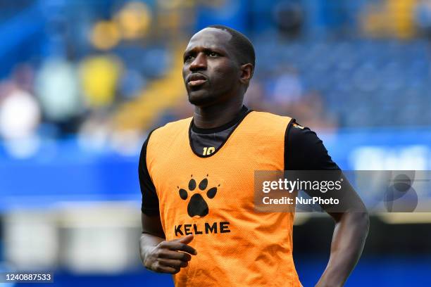 Moussa Sissoko of Watford warming up before the Premier League match between Chelsea and Watford at Stamford Bridge, London on Sunday 22nd May 2022.