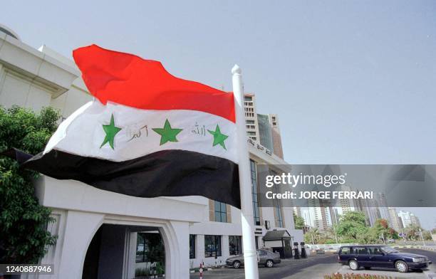 The Iraqi flag flies in front of Al-Ain Palace Hotel, the temporary base of Iraq's diplomatic mission in the United Arab Emirates, in Abu Dhabi 05...