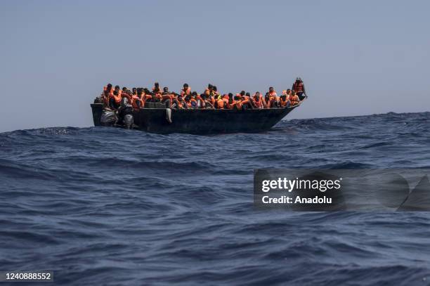Group of migrants are seen in a boat in Malta SAR Zone, on May 24, 2022. In the fifth operation of the 91st rescue mission of Astral, the sailboat of...