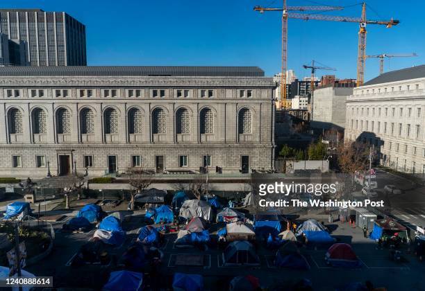 Fenced in tent city for the homeless population run by Urban Alchemy is a block away the San Francisco City Hall in the Tenderloin neighborhood of...