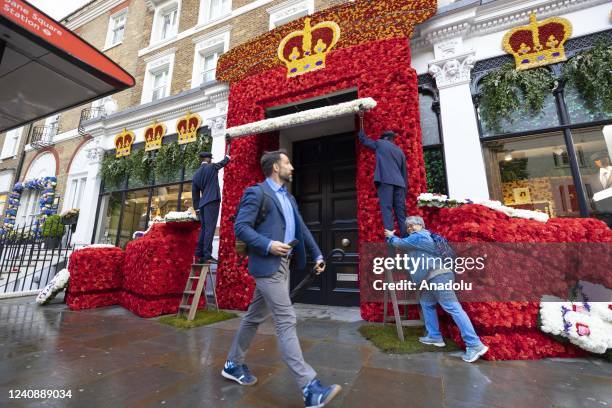 Shops, restaurants, hotels and florists in the Chelsea district of London are decorated with "British Icons", this year's theme, as part of the...