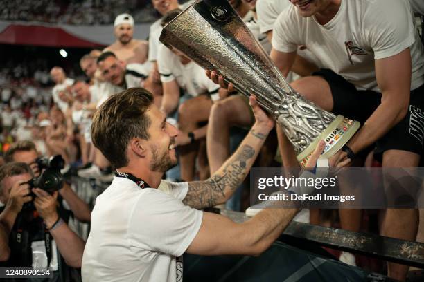 Goalkeeper Kevin Trapp of Eintracht Frankfurt celebrates with the UEFA Europa League trophy the UEFA Europa League final match between Eintracht...