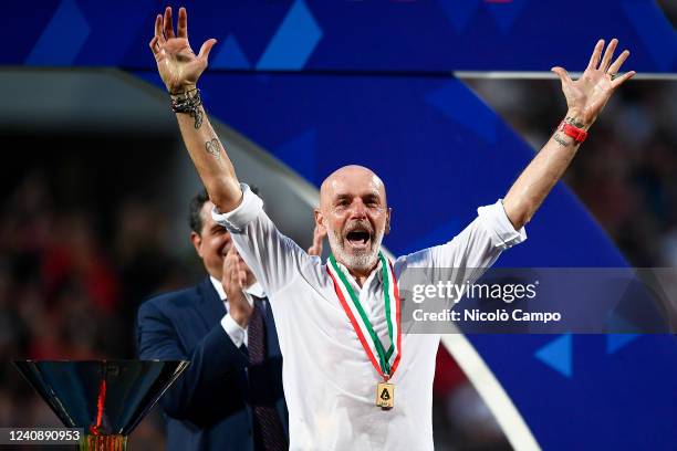 Stefano Pioli, head coach of AC Milan, celebrates during the award ceremony following the Serie A football match between US Sassuolo and AC Milan. AC...