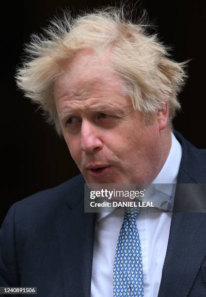 Britain's Prime Minister Boris Johnson leaves from 10 Downing Street in central London on May 25, 2022 to attend the weekly session of Prime...