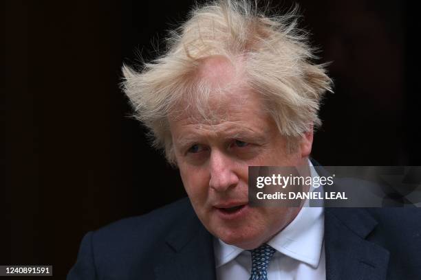 Britain's Prime Minister Boris Johnson leaves from 10 Downing Street in central London on May 25, 2022 to attend the weekly session of Prime...