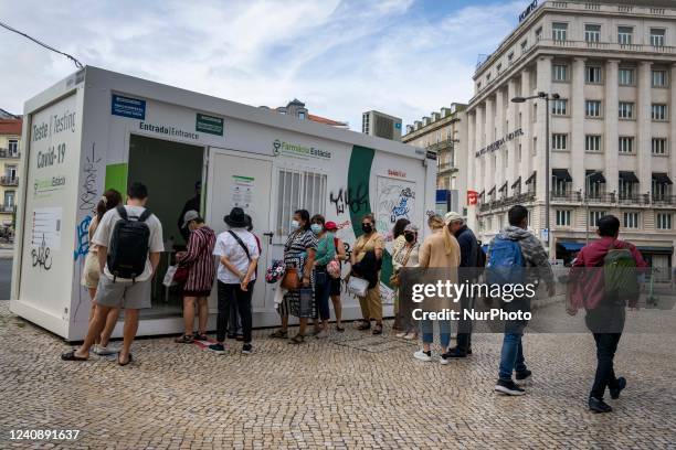 People are seen lining up to wait for a COVID-19 test at a stand located on Liberdade Avenue. Lisbon, May 23, 2022. Portugal is the European Union...