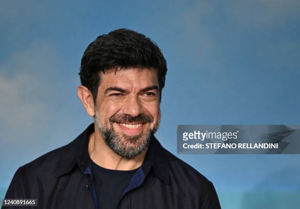 Italian actor Pierfrancesco Favino smiles during a press conference for the film "Nostalgia" at the 75th edition of the Cannes Film Festival in...
