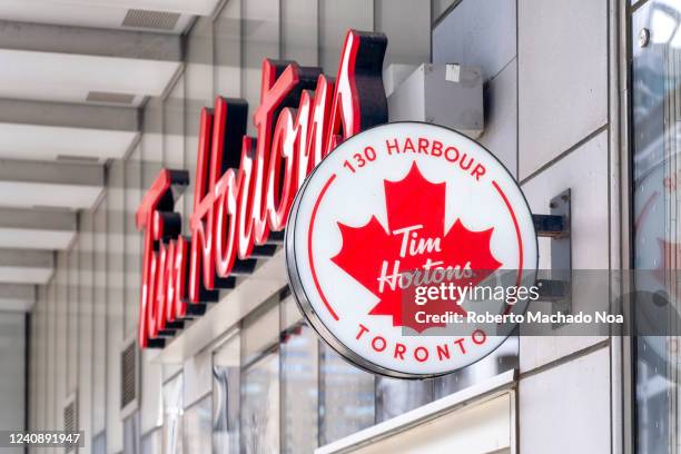Business sign of a Tim Horton's cafeteria. The food and drink chain is very popular in the country.