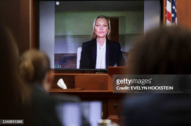 Model Kate Moss testifies via video link at the Fairfax County Circuit Courthouse in Fairfax, Virginia, on May 25, 2022. - Actor Johnny Depp is suing...