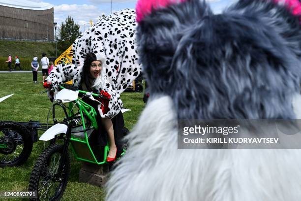 Cosplayer dressed up as Cruella de Vil takes part in a parade of fantastic electric transport concepts as part of Geek day in Skolkovo Innovation...