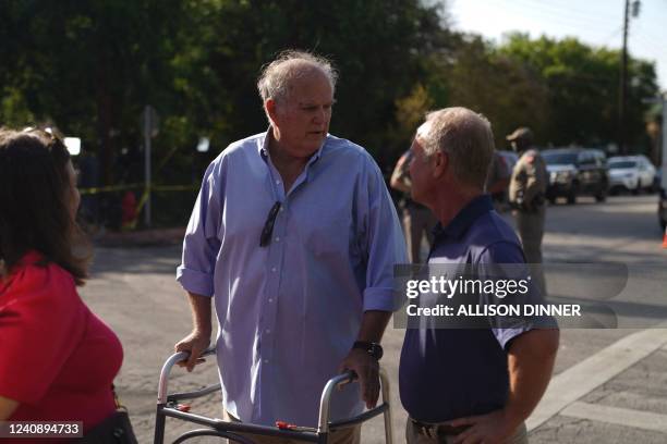Uvalde, Texas, Mayor Don McLaughlin leaves the Robb Elementary School after a visit on May 25, 2022. - A tight-knit Latino community in Texas was...