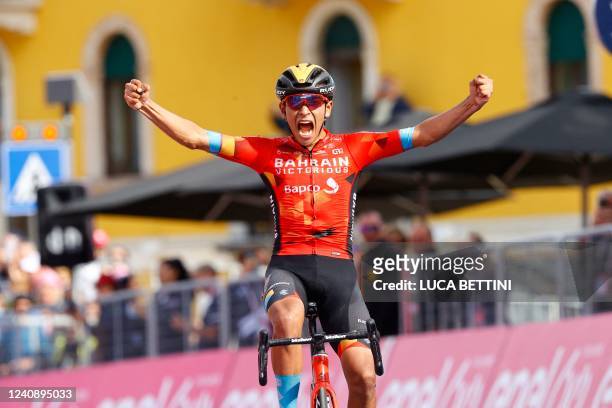 Team Bahrain's Colombian rider Santiago Buitrago celebrates after crossing the finish line of the 17th stage of the Giro d'Italia 2022 cycling race,...