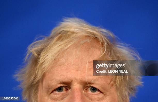 Britain's Prime Minister Boris Johnson attends a press conference in the Downing Street Briefing Room in central London on May 25 following the...