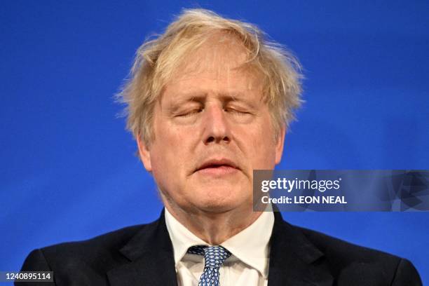 Britain's Prime Minister Boris Johnson attends a press conference in the Downing Street Briefing Room in central London on May 25 following the...