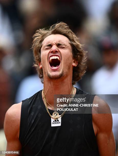 Germany's Alexander Zverev reacts after winning against Argentina's Sebastian Baez at the end of their men's singles match on day four of the...