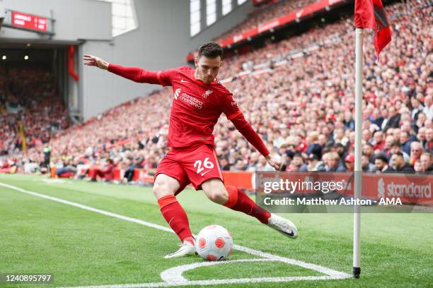 Andrew Robertson of Liverpool takes a corner during the Premier League match between Liverpool and Wolverhampton Wanderers at Anfield on May 22, 2022...