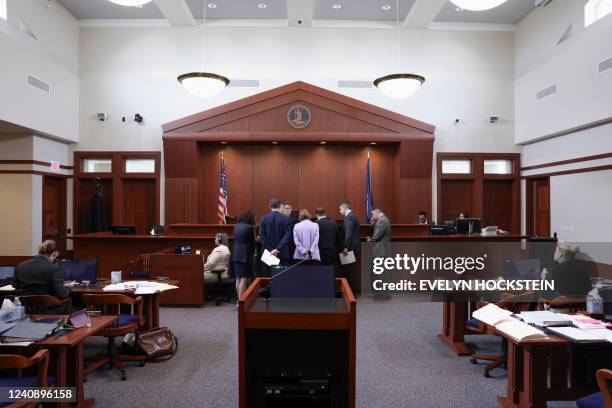 Judge Penney Azcarate speaks with actor Johnny Depp's and ex-wife actor Amber Heard's attorneys in a sidebar during Depp's defamation trial against...