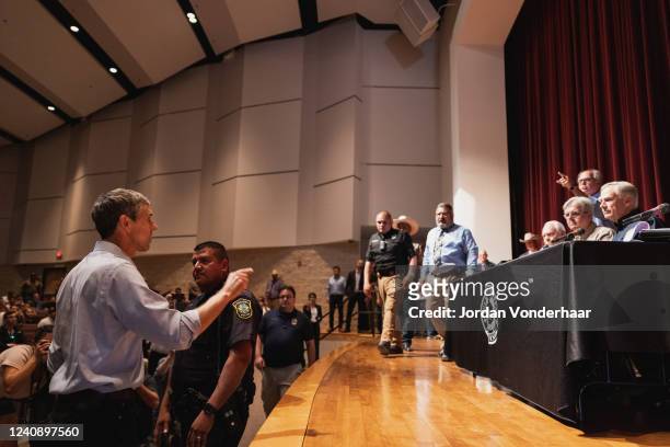 Democratic gubernatorial candidate Beto O'Rourke interrupts a press conference held by Texas Gov. Greg Abbott following a shooting yesterday at Robb...