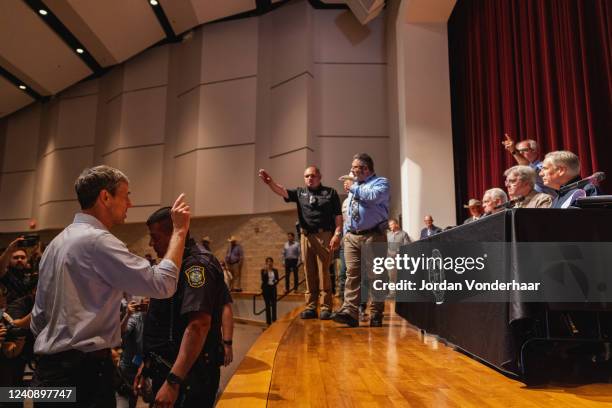 Democratic gubernatorial candidate Beto O'Rourke interrupts a press conference held by Texas Gov. Greg Abbott following a shooting yesterday at Robb...