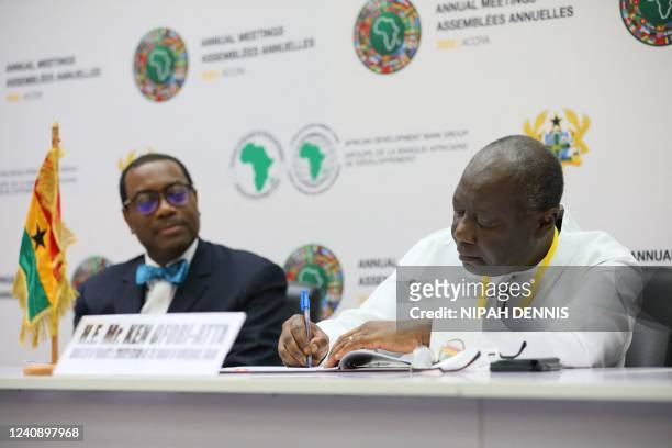 Kenneth Ofori-Atta , Ghanas Minister of Finance, signs an agreement for the Ghana Solar Photovoltaic-Based Net Metering Project in Accra, Ghana, on...