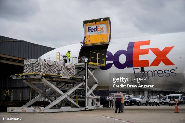 Pallets of baby formula are unloaded from a FedEx cargo plane upon arrival at Dulles International Airport on May 25, 2022 in Dulles, Virginia. More...