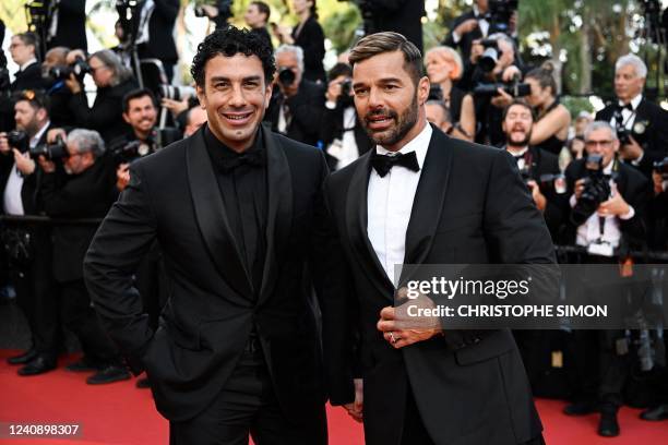 Puerto Rican singer Ricky Martin and his husband Jwan Yosef arrive for the screening of the film "Elvis" during the 75th edition of the Cannes Film...