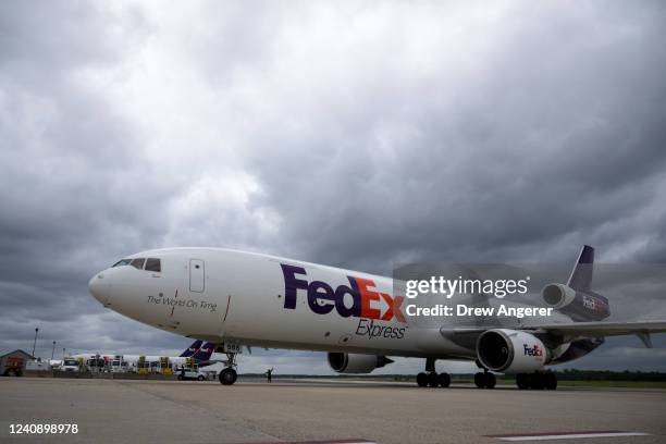 FedEx cargo plane carrying pallets of baby formula arrives at Dulles International Airport on May 25, 2022 in Dulles, Virginia. More than 100 pallets...