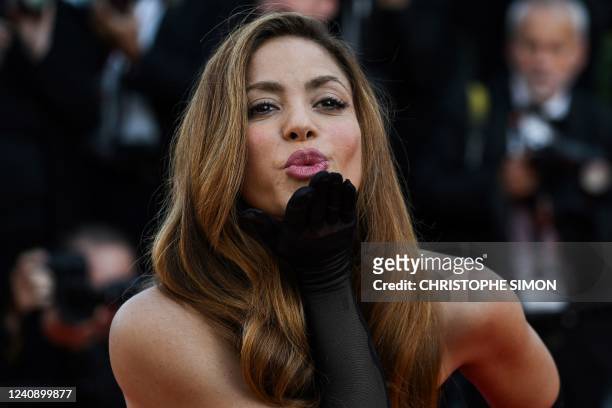 Colombian singer Shakira blows kisses as she arrives for the screening of the film "Elvis" during the 75th edition of the Cannes Film Festival in...