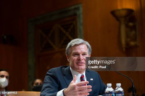 Director Christopher Wray speaks during a Senate Appropriations Subcommittee hearing on the fiscal year 2023 budget for the FBI at the U.S. Capitol...