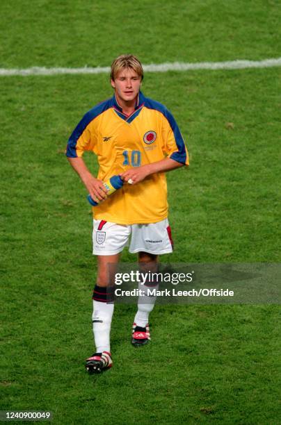 June 1998, Lens - FIFA World Cup - Colombia v England - David Beckham of England departs wearing the exchanged shirt of Carlos Valderrama.