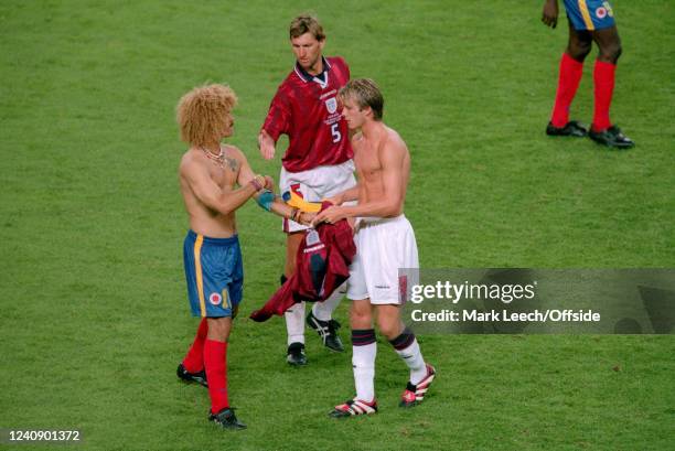 June 1998, Lens - FIFA World Cup - Colombia v England - Tony Adams of England offers to shake the hand of Colombian captain Carlos Valderrama who...