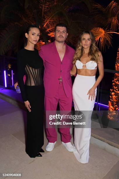 Nina Dobrev, Eli Mizrahi and Zoey Deutch attend an intimate dinner hosted by Monot during the 75th Cannes Film Festival at Villa Bagatelle on May 25,...