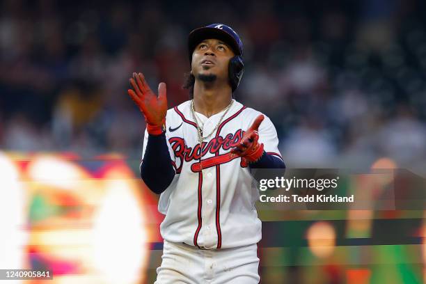 Ozzie Albies of the Atlanta Braves reacts after a two run double during the second inning against the Philadelphia Phillies at Truist Park on May 25,...