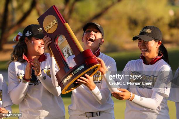 Rachel Heck of the Stanford Cardinal celebrates with the national championship trophy after defeating the Oregon Ducks during the Division I Womens...