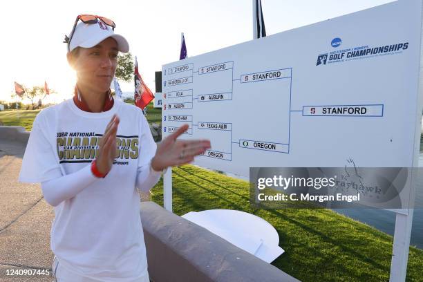 Head coach Anne Walker of the Stanford Cardinal celebrates after placing the final Stanford Cardinal sticker on the bracket after defeating the...