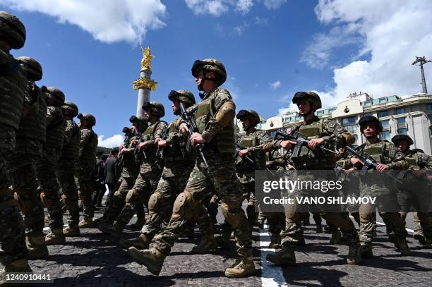 Georgian servicemen march on the central Freedom Square during the celebrations of Georgia's Independence Day in Tbilisi on May 26, 2022.