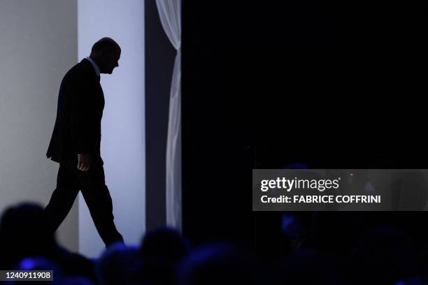 German Chancellor Olaf Scholz leaves the stage after he addressed the assembly during the World Economic Forum annual meeting in Davos on May 26,...