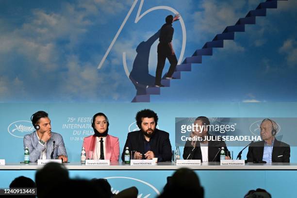Iranian film director Saeed Roustayi speaks during a press conference for the film "Leila's Brothers" with Iranian-US actor Payman Maadi, Iranian...