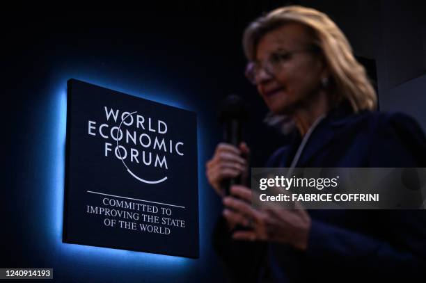 Participant asks a question during a session at the World Economic Forum annual meeting in Davos on May 26, 2022.