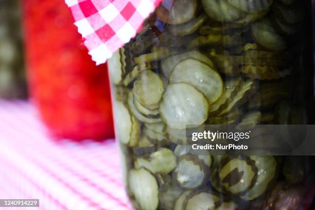 Pickles are seen on a stand in Krakow, Poland on May 25, 2022.