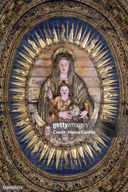 View of a detail of the ceiling of the "Girolamini" church in Naples with a bas-relief depicting a Madonna with child, just opened, after the...