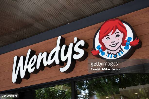 Sign for the fast food brand Wendy's on 18th May 2022 in London, United Kingdom. Wendy's is an American international fast food restaurant chain...