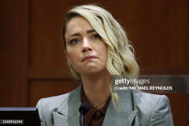 Actor Amber Heard testifies during the 50 million US dollar Depp vs Heard defamation trial at the Fairfax County Circuit Court in Fairfax, Virginia,...