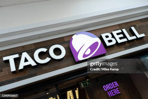 Sign for the fast food brand Taco Bell on 18th May 2022 in London, United Kingdom. Taco Bell is an American-based chain of fast food restaurants...