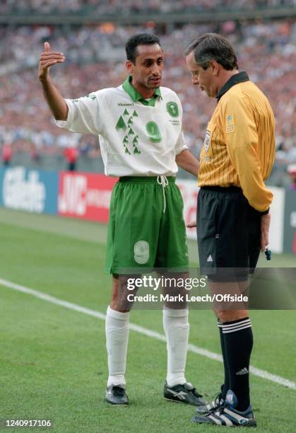 June 1998, Paris - FIFA World Cup - France v Saudi Arabia - Sami Al Jaber of Saudi Arabia in conversation with referee Arturo Brizio Carter.