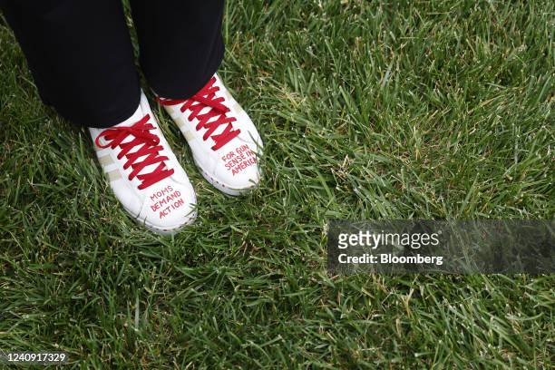 The sneakers of a member of Moms Demand Action during a rally calling for action on gun safety on Capitol Hill in Washington, D.C., US, on Thursday,...