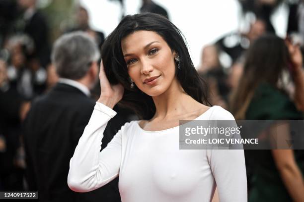 Model Bella Hadid arrives for the screening of the film "Broker" during the 75th edition of the Cannes Film Festival in Cannes, southern France, on...