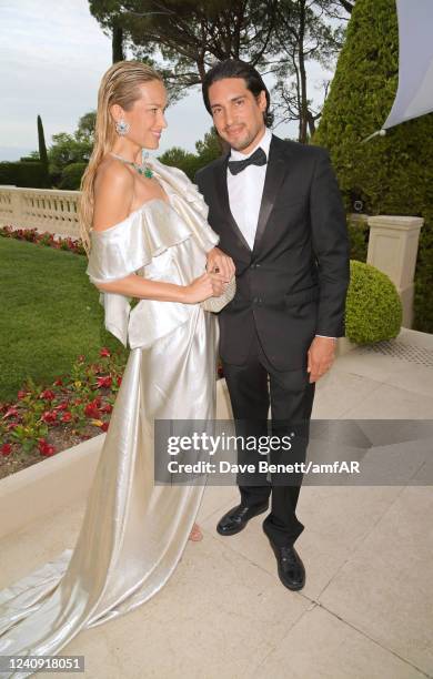 Petra Nemcova and Benjamin Larretche attend the amfAR Gala Cannes 2022 at the Hotel du Cap-Eden-Roc on May 26, 2022 in Cap d'Antibes, Côte d'Azur.